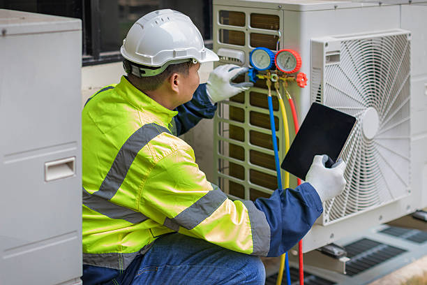Professional Hvac technician working in Bellville, OH